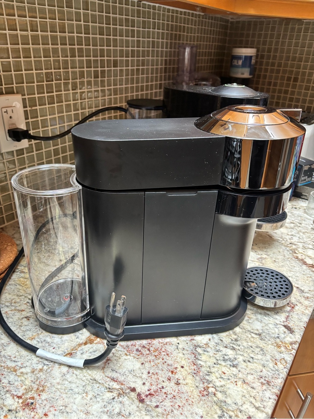 Nespresso Black Single-Serve Coffee & Espresso Machine with Clear Water Tank